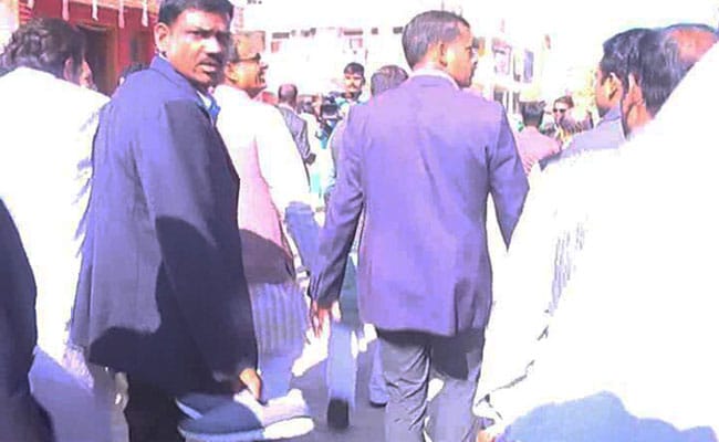 Chief Minister Shivraj Singh Chouhan's Shoes Carried By Security Officer