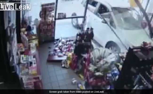 Caught On CCTV: Car Crashes Into Store, Nearly Crushes Man To Death