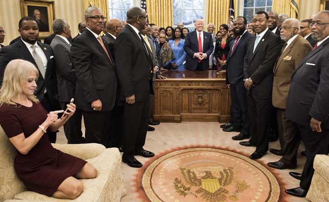 Donald Trump Aide Kellyanne Conway Says Meant No Harm Kneeling On White House Sofa