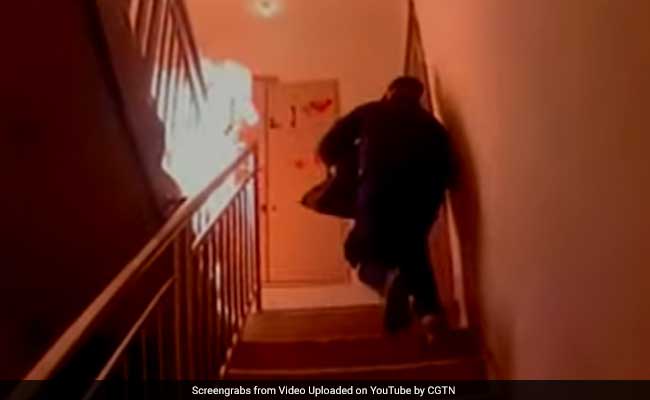 Police Officer Drags Burning Gas Cylinder Out Of Building In Dramatic Video