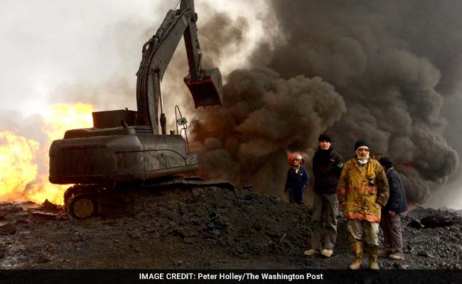 300-Feet High Inferno: On The Front Lines With Oil Workers Battling ISIS