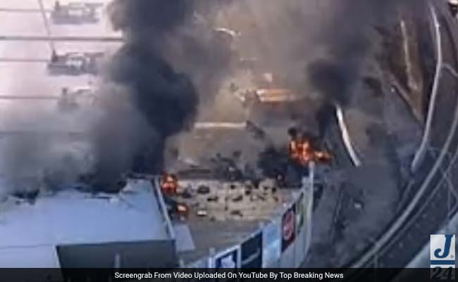 'Massive Fireball' As Small Aircraft Crashes Into Shops Near Melbourne, 5 Dead