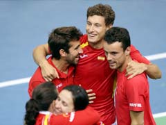 Britain, Spain Advance in Davis Cup, Rain Halts Argentina
