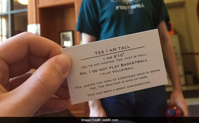 Man Hands Out 'Yes I'm Tall' Business Cards When Asked About His Height