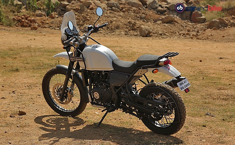 bajaj dominar vs re himalayan comparison