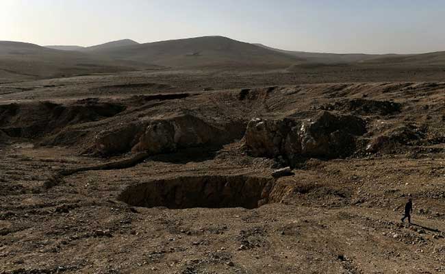 ISIS Dumped Bodies In Sinkhole, But Full Scale Of Killings Might Not Be Known For Years