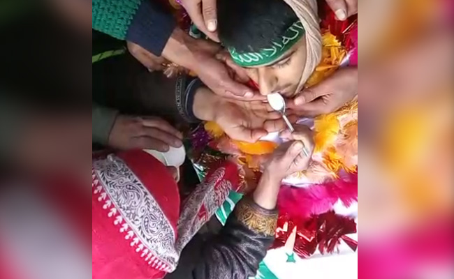 Image Of A Kashmiri Mother Offering Milk To Dead Teen Went Viral