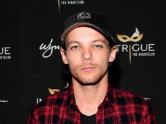 One Direction Band's Louis Tomlinson Arrested In Airport Tussle