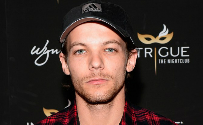 One Direction Band's Louis Tomlinson Arrested In Airport Tussle