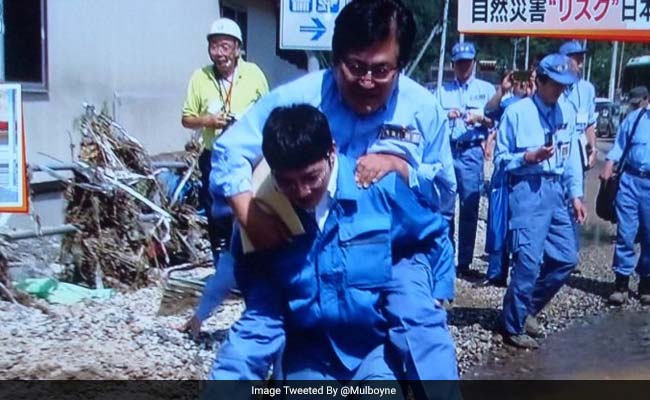 Senior Japanese Minister Shunsuke Mutai, Carried Over Flood Waters Last Year, Resigns