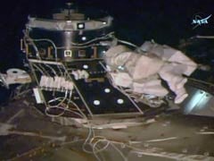 Space Blanket Floats Away During Historic Spacewalk
