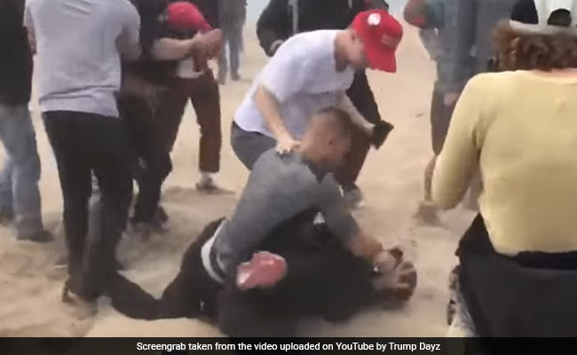 A Pro-Trump Rally Ends Up With A Man Getting Beaten With A 'Make America Great Again' Sign
