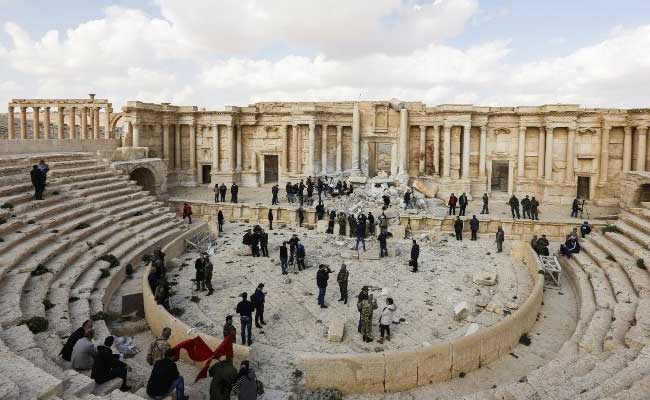 Atop Palmyra's Damaged Theatre, Syrian Musicians Sing Of Return