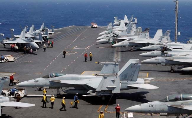 North Korea Warns Of 'Merciless' Strikes As US Carrier Joins South Korea Drills