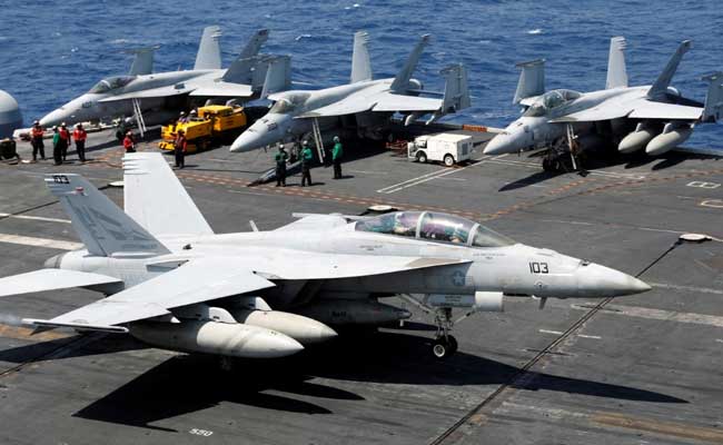 US Carrier Puts On Show Of 'Commitment', Not Power, In South China Sea