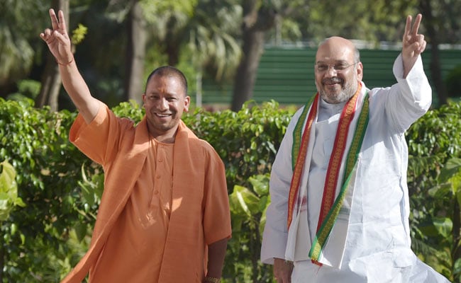 Image result for Yogi Adityanath with Amit shah