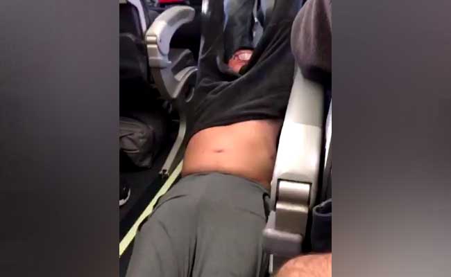 United Under Fire For Dragging A Passenger Off An Overbooked Flight