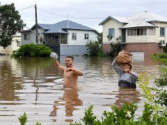 2 Dead, Tens Of Thousands Stranded By Australia Floods