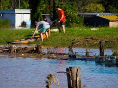 Australia Floodwaters Still Rising, Police Search For Missing