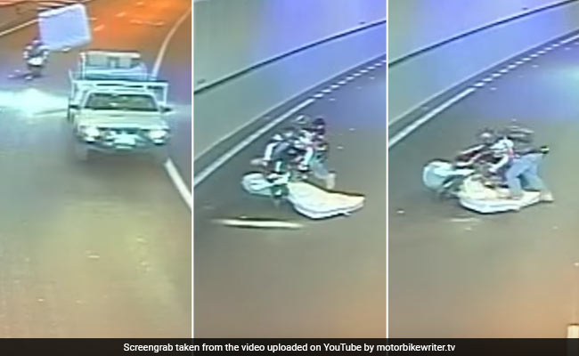 Caught On CCTV: Flying Mattress Hits Biker, But Also Saves His Life