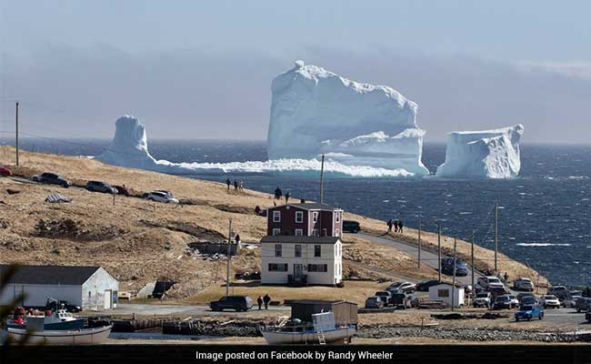 Giant Iceberg Greets Coastal Town In Canada. The Photos Are Must See