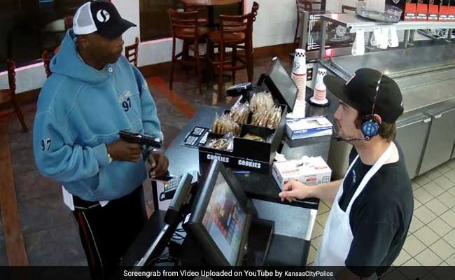 Watch: Cashier Has The Most Calm Reaction To Being Robbed At Gunpoint