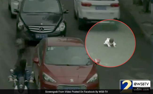 Caught On Camera: Baby Run Over By 2 Cars In China, Escapes Unharmed