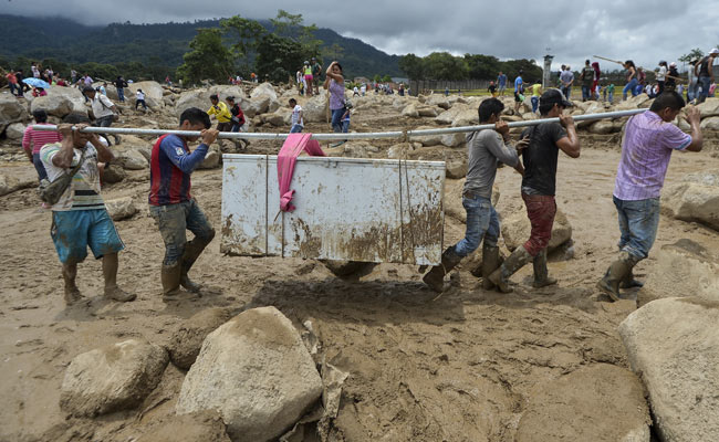 Number Of Dead Rise To 290 As Colombia Probes Cause Of Mudslides