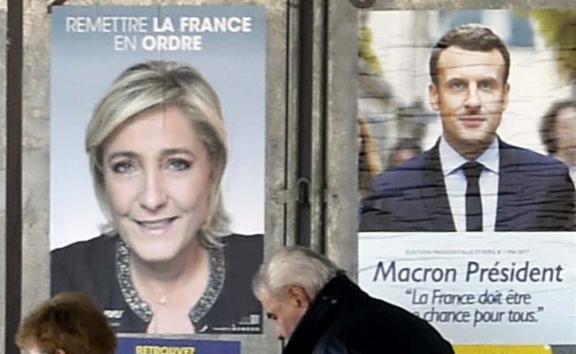 Emmanuel Macron, Marine Le Pen Vie To Embody Change In Presidential Run-Off