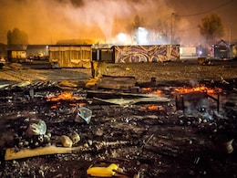 Huge Fire Destroys France's Grande-Synthe Migrant Camp Huge Fire Destroys France's Grande-Synthe Migrant Camp