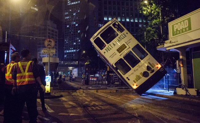 Driver Arrested After Hong Kong Tram Flips Over, Injuring 14