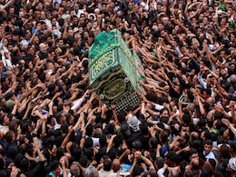 Kadhimiyah To Baghdad: Shiite Faithful Throng Carries Symbolic Coffin In Devastated Iraq Kadhimiyah To Baghdad: Shiite Faithful Throng Carries Symbolic Coffin In Devastated Iraq