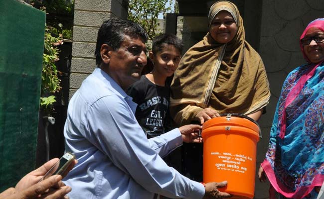 saffron dustbin bjp ahemdabad