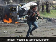 Photographer Puts Down Camera To Save Boy In Syria, Then Breaks Down