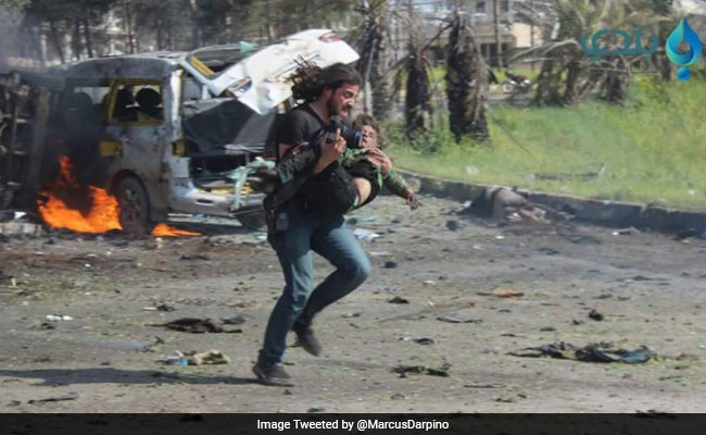 Photographer Puts Down Camera To Save Boy In Syria, Then Breaks Down