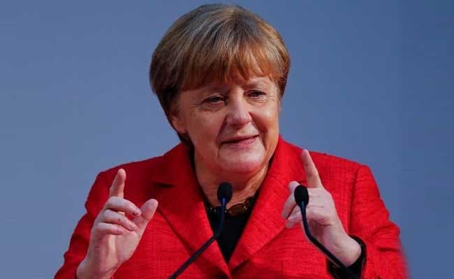 Angela Merkel's Conservatives Clinch Victory In Key State Vote: Exit Polls