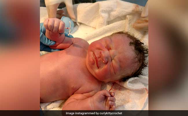 Baby Poses With Birth Control Device That Was To Prevent Mom's Pregnancy