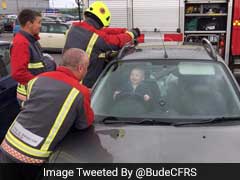 Baby Loves Every Minute Of Being Stuck In Locked Car As Firemen Struggle