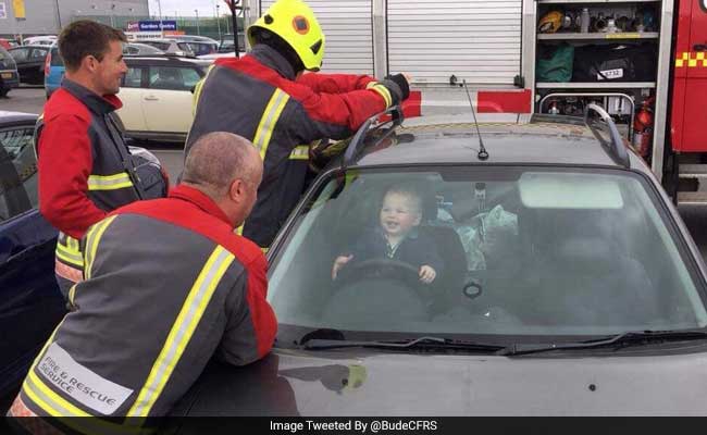 Baby Loves Every Minute Of Being Stuck In Locked Car As Firemen Struggle