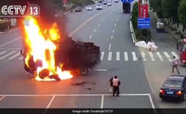 Biker Miraculously Survives After Crashing Into Truck Which Burst Into Flames