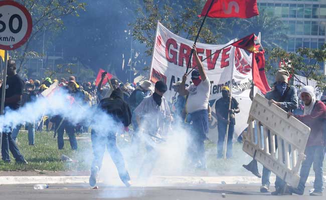 Violence Erupts At Protest Against Brazil's President Michel Temer, Austerity