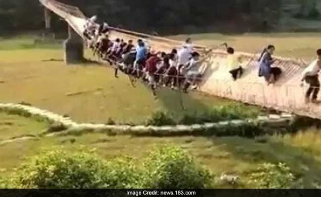 Scary Video Shows Swinging Bridge Tilted To One Side, 20 Tourists On It