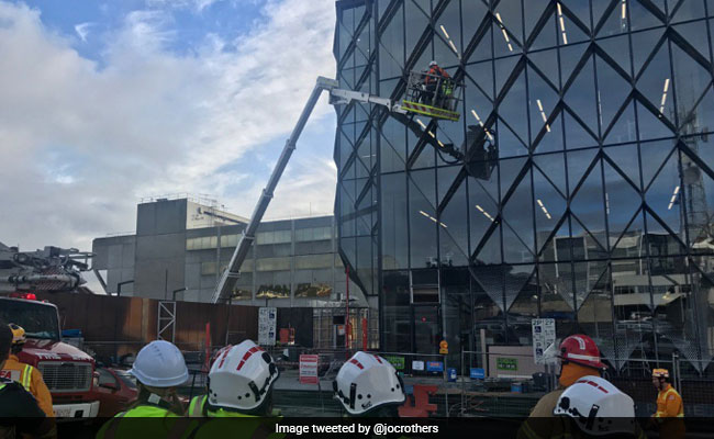 Workers Dramatically Rescued From Crane After Being Stranded Mid-Air