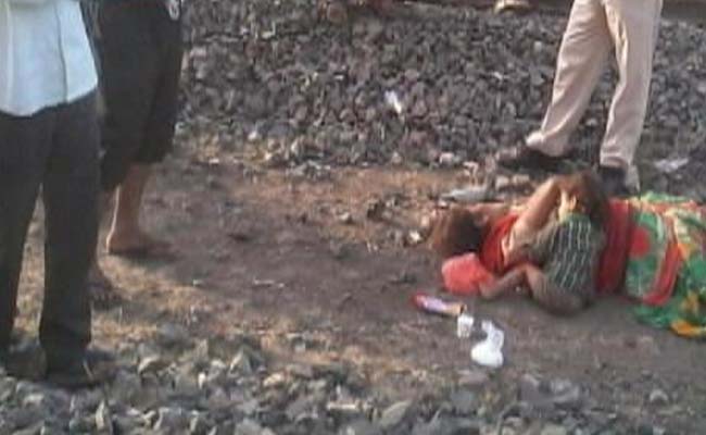 Mother Dead By Tracks, Wailing Infant Tries To Breastfeed