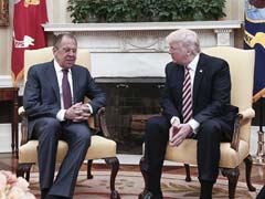 Presence Of Russian Photographer In Oval Office Raises Alarms