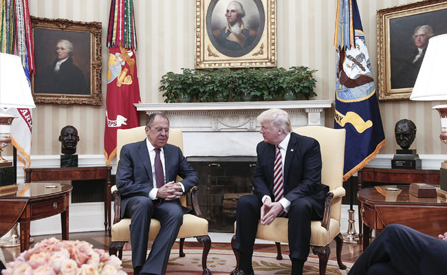 Presence Of Russian Photographer In Oval Office Raises Alarms