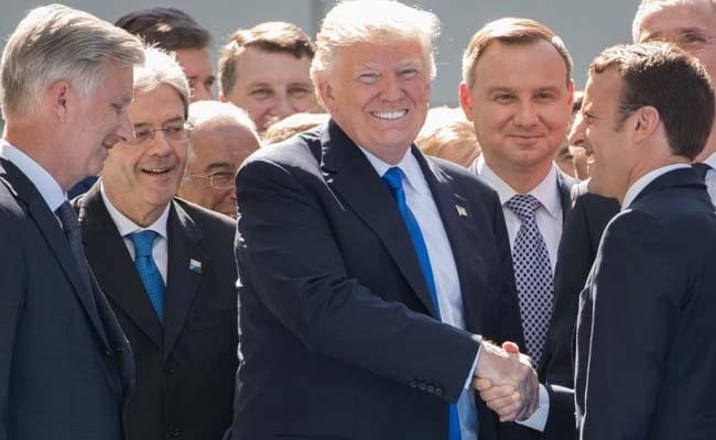 Europeans try to convince Trump not to pull out of climate accord