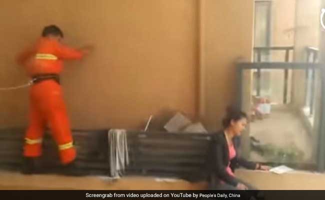 Firefighter Walks On Narrow Ledge To Save Suicidal Woman On 15th Floor