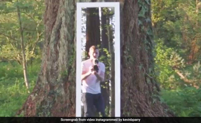 This Illusion Of A Man Walking Through Mirror Will Baffle You