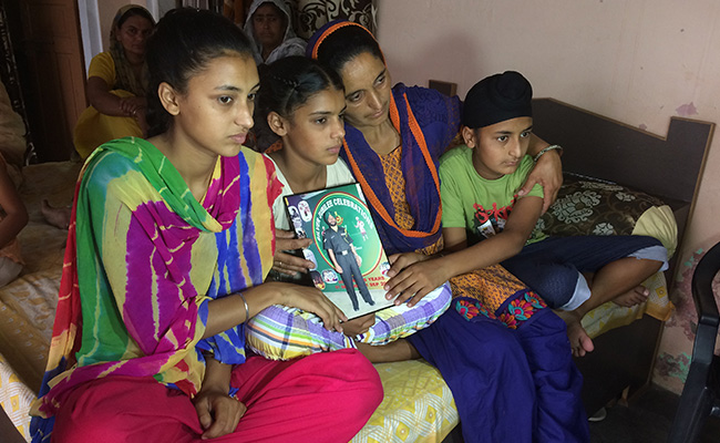 Civil Servant Couple Adopts Daughter Of Armyman Killed In Kashmir